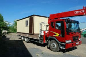 Услуга доставки строительных вагончиков на объект